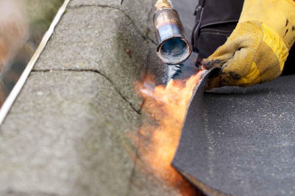 Roofers Kilmarnock repairing a Bitumen flat roof