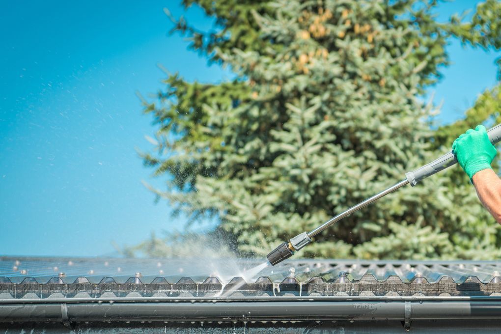Roofers Kilmarnock pressure cleaning a gutter