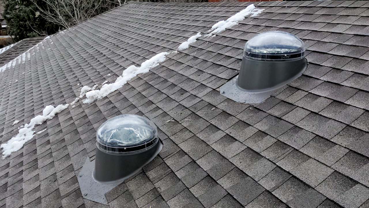 Roofers Kilmarnock double sun tunnel in residential roof roof with an extended wiper