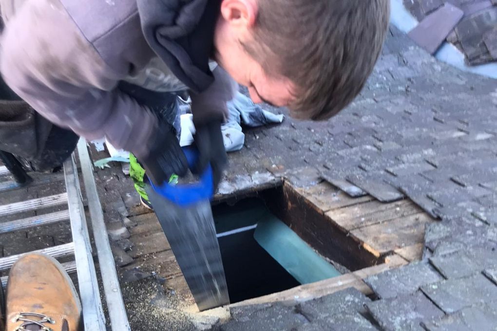 Roofers Kilmarnock installing a Velux skylight
