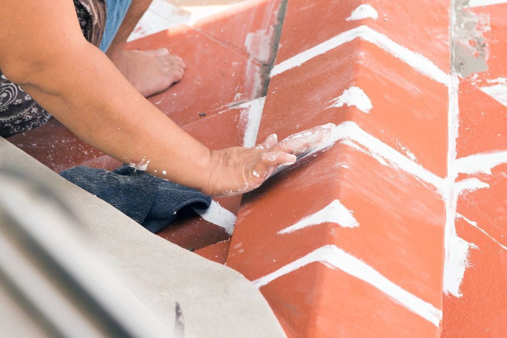 Roofers Kilmarnock repairing roof ridge tiles