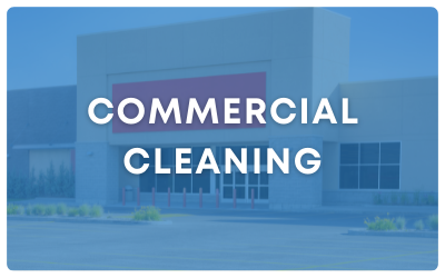 Commercial cleaning sign over a blue-tinted storefront building