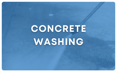 Blue sign with white text reading “CONCRETE WASHING.”