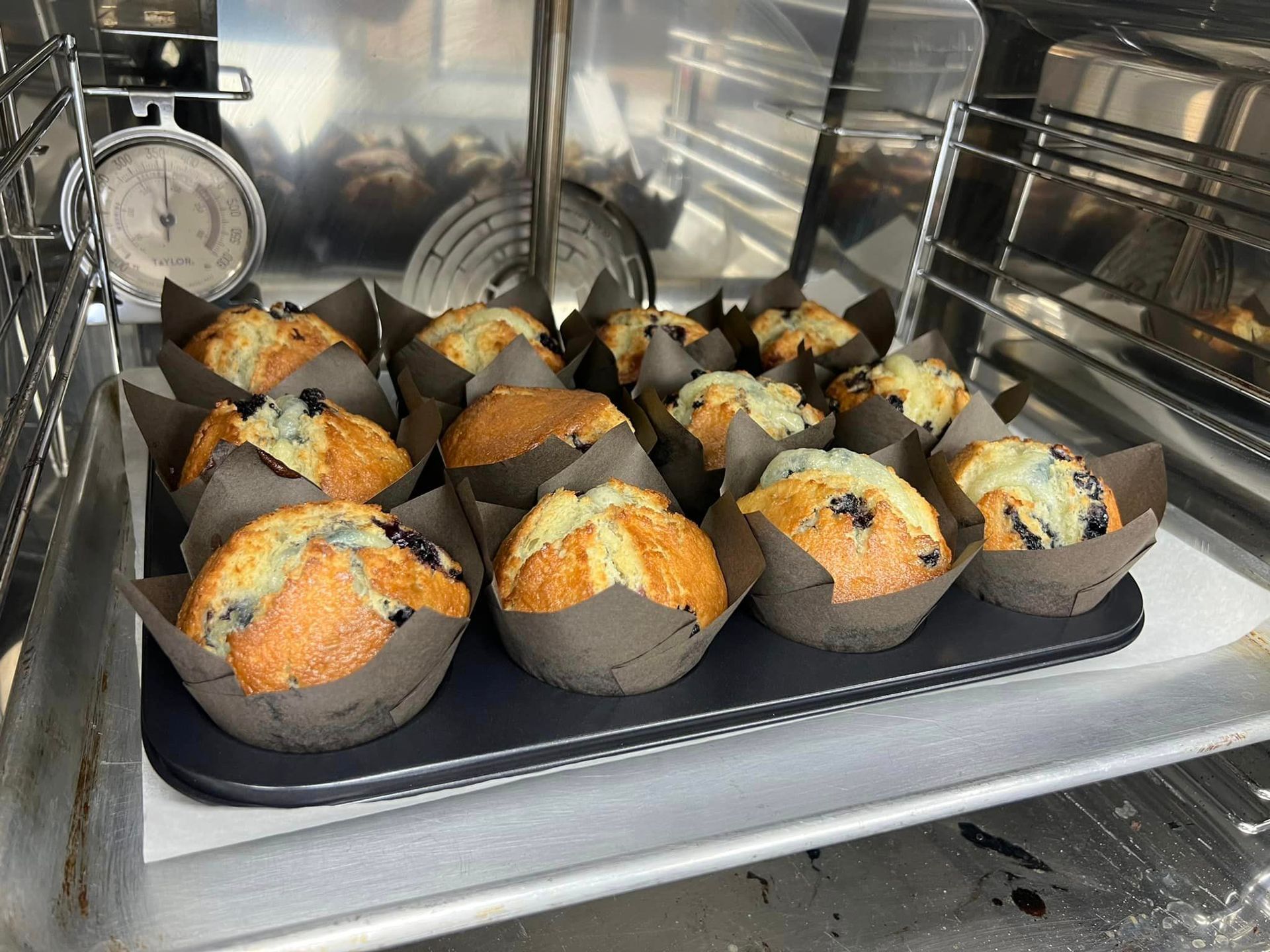 Freshly Baked Muffins in oven for sale in Lara's Market Convenience Store.