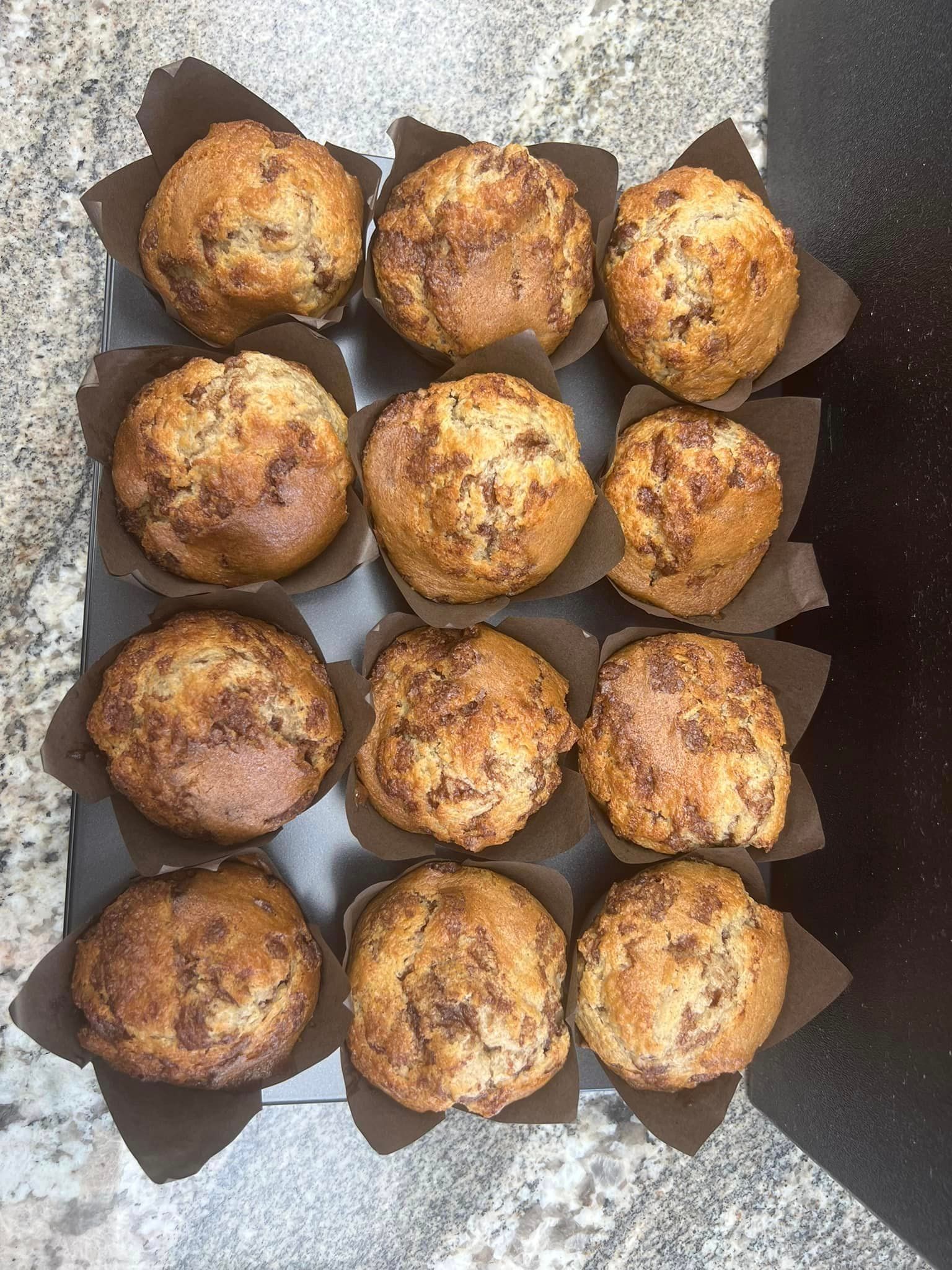 Muffins in brown paper wrapping in Lara's Market Convenience Store.
