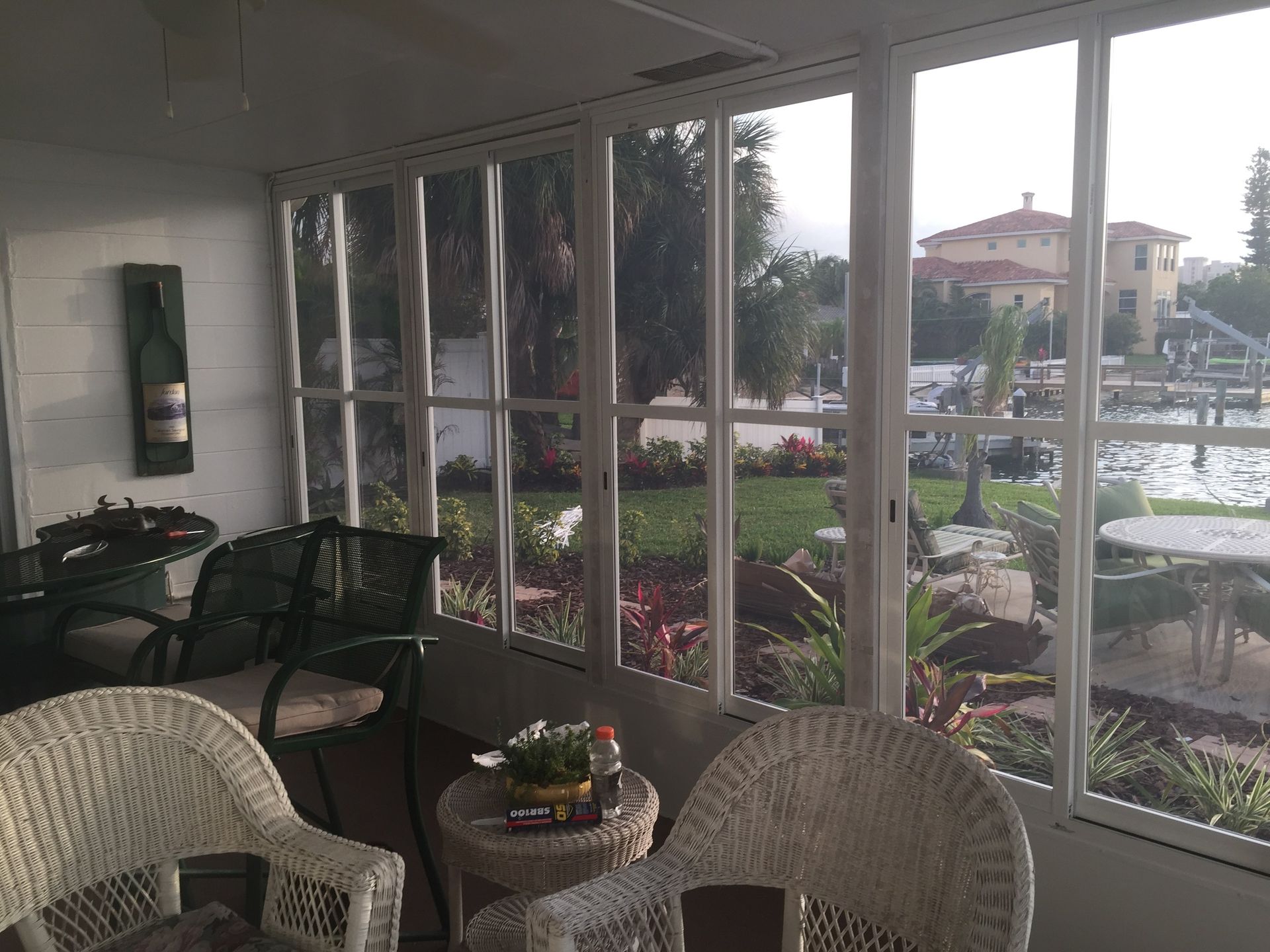 Screened patio with torn mesh needing lanai rescreening service
