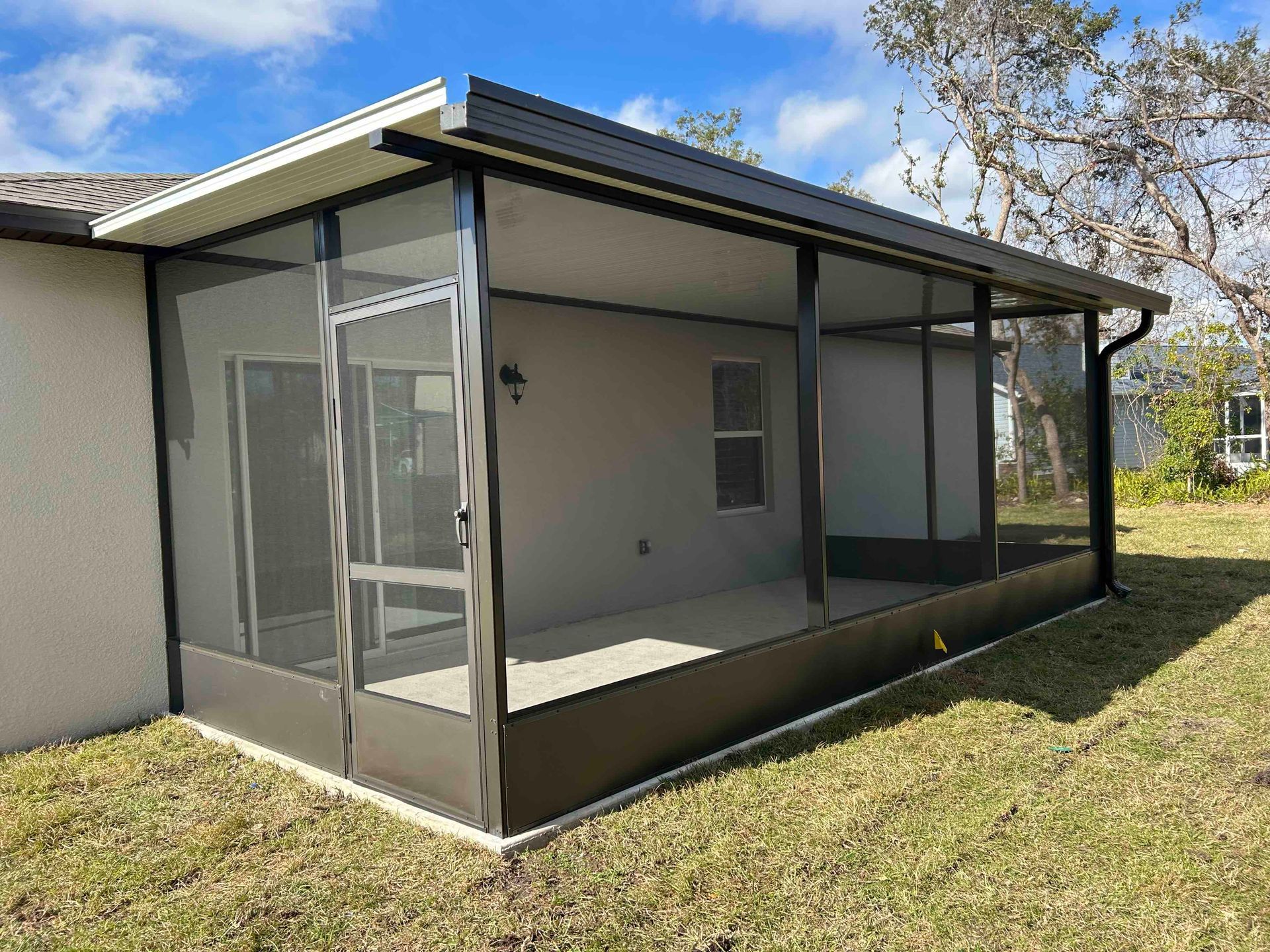 Torn pool cage screen repair for a Florida backyard enclosure
