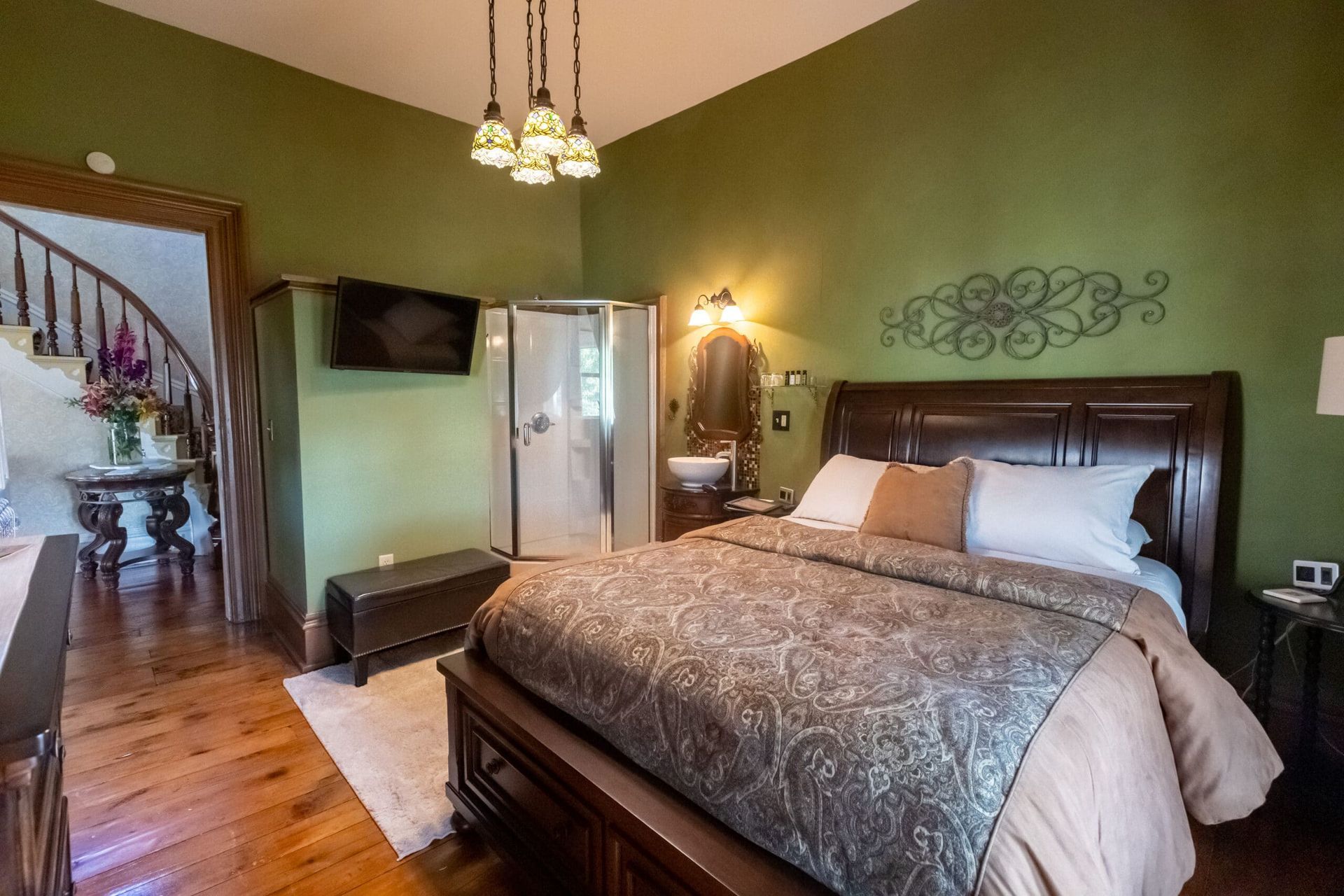There is a large bed in the middle of the room.