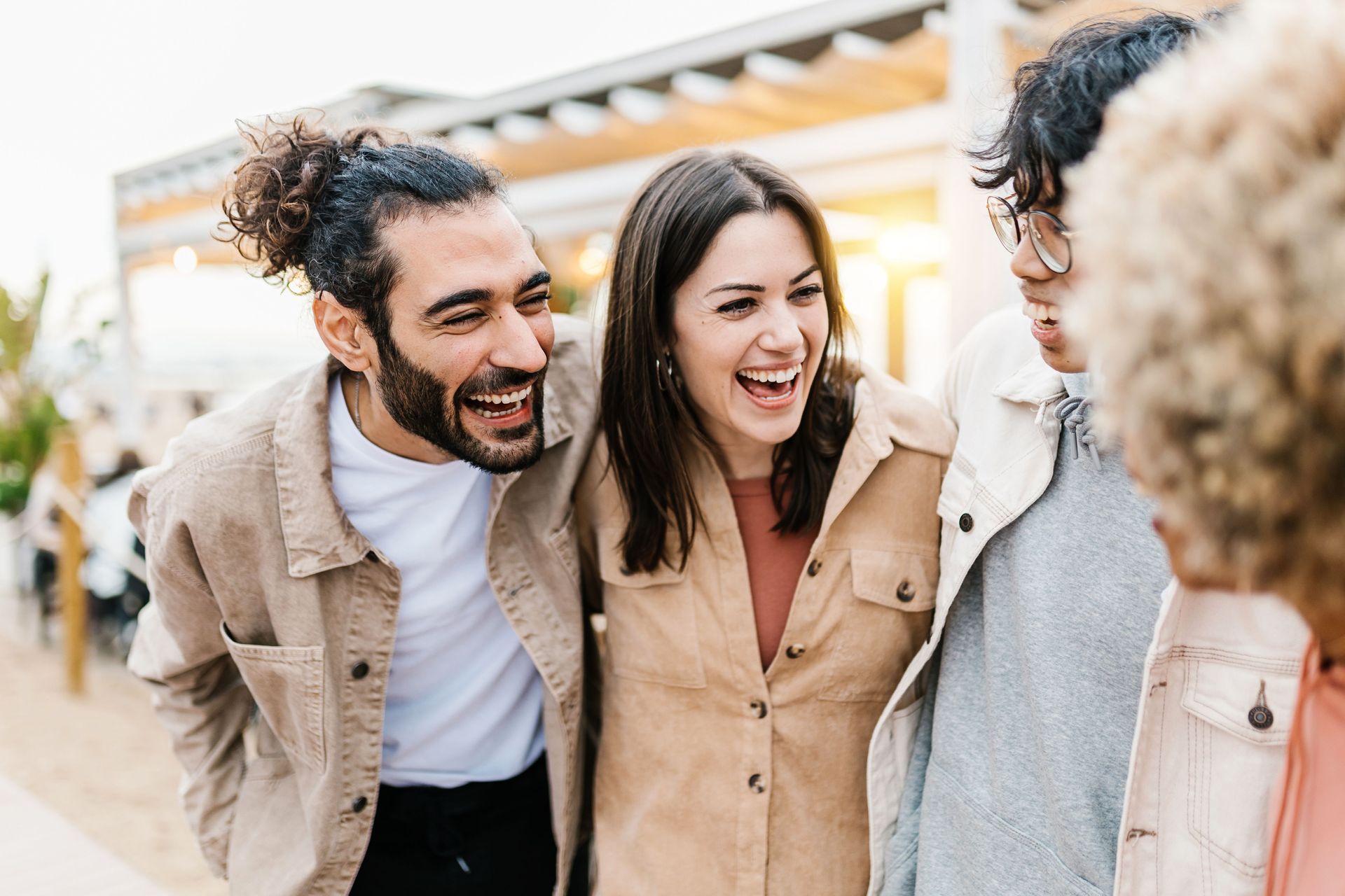 A group of friends laughing and talking.