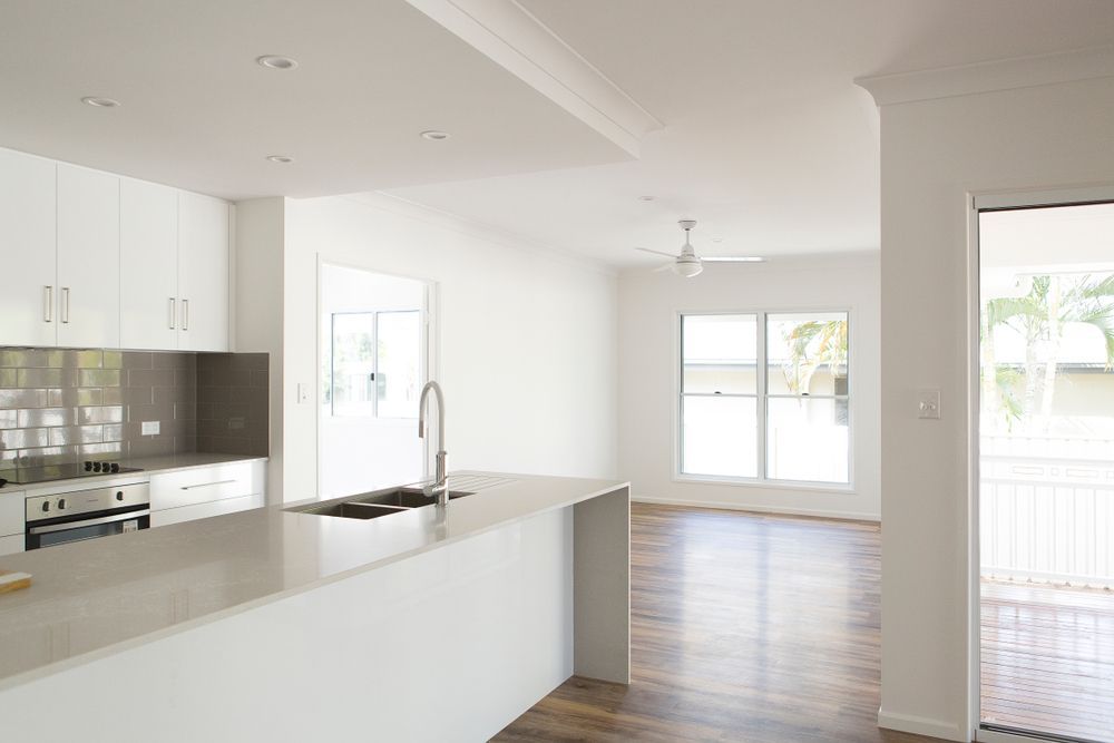 Modern Kitchen With White Cabinets, Grey Countertops — Verastone In Fyshwick, ACT