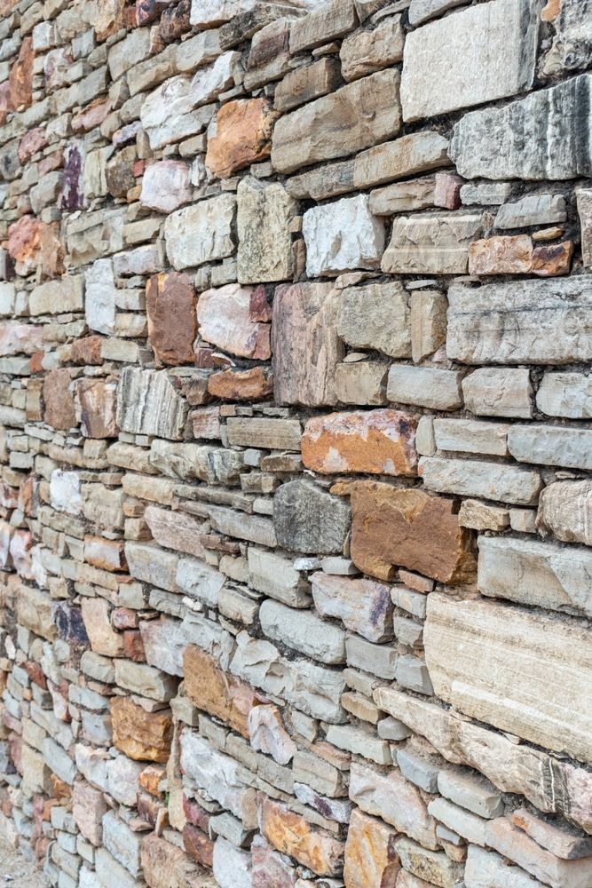 Stone Wall With Varying Shades of Tan, Brown, and Grey — Verastone In Fyshwick, ACT
