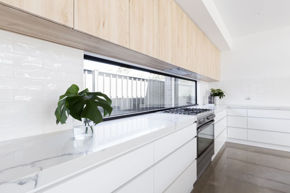 Modern White Kitchen With Marble Countertop — Verastone In Fyshwick, ACT