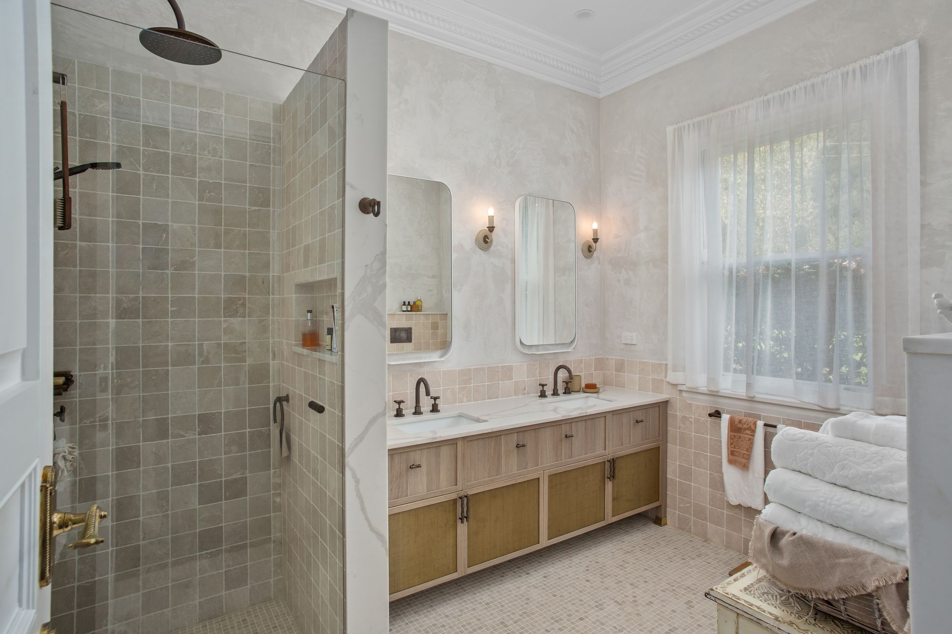 Bright Bathroom With Glass Shower, Marble Vanity, And Stacked White Towels — Shona Design In Mittagong, NSW