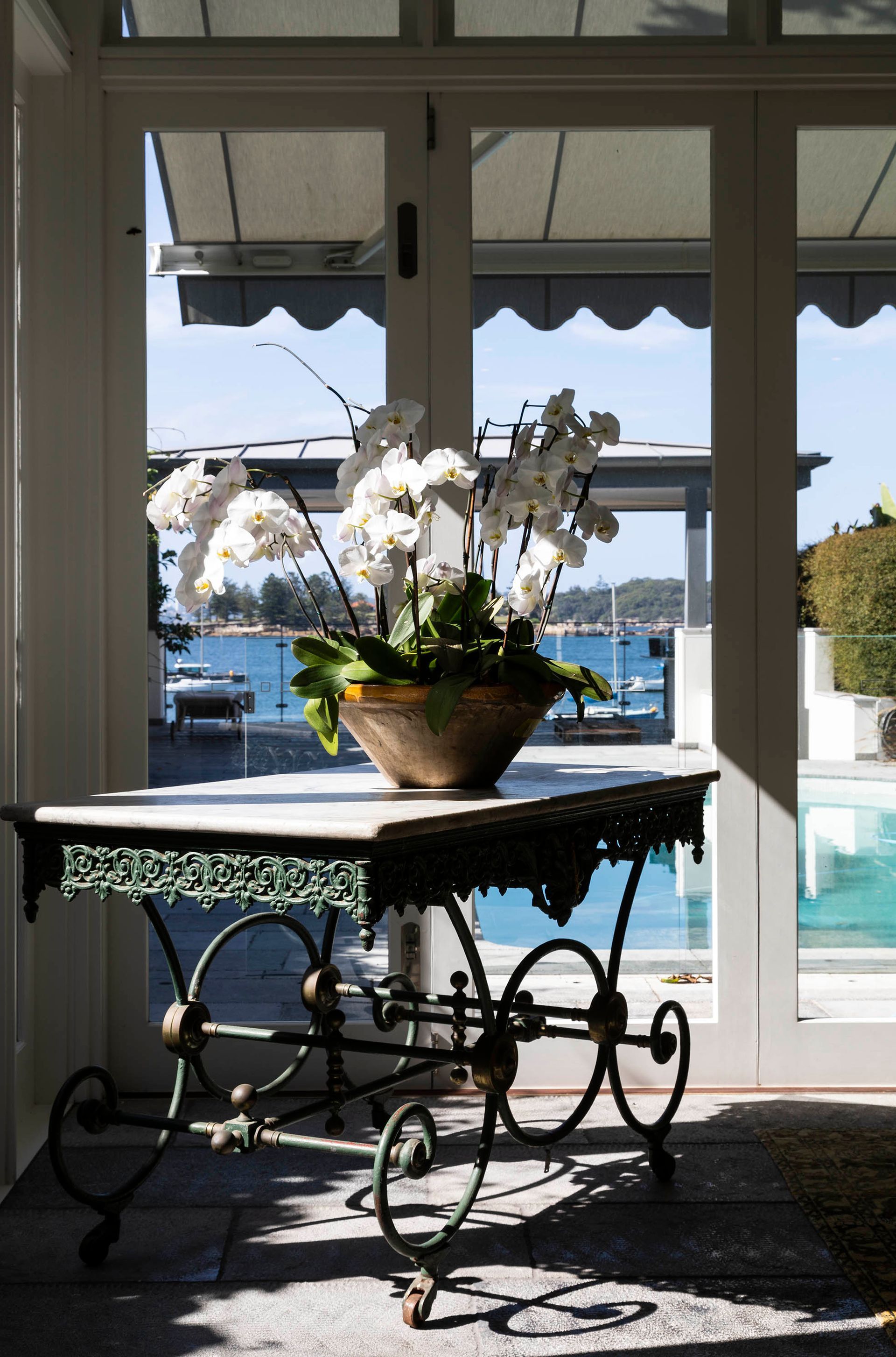 Flower Arrangement On A Wrought-iron Table — Shona Design In Mittagong, NSW