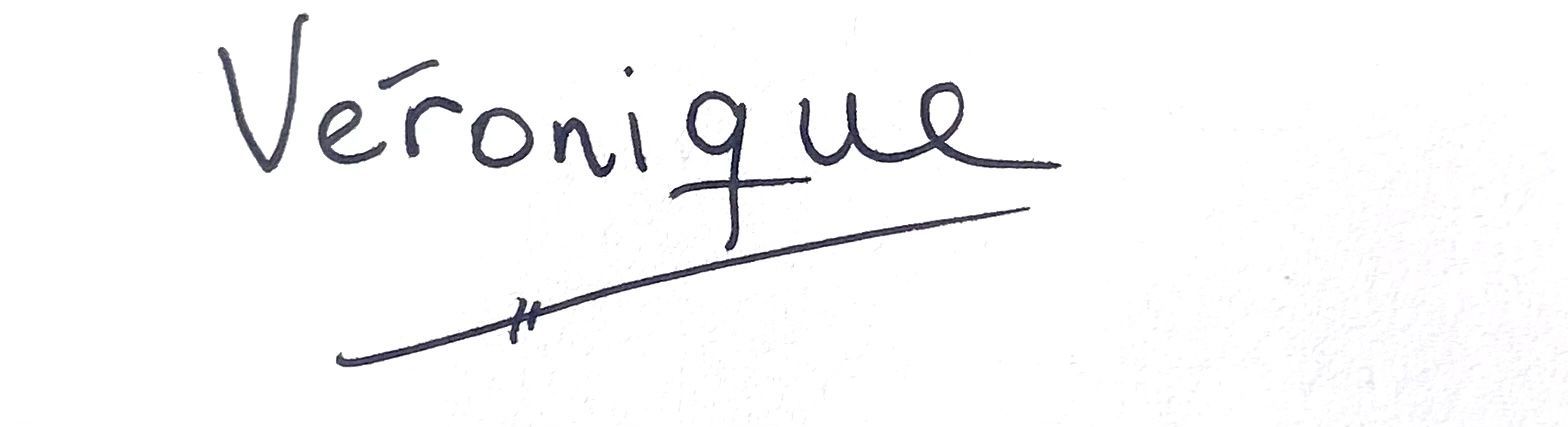 Nombre escrito a mano “Veronique” con una línea diagonal debajo.
