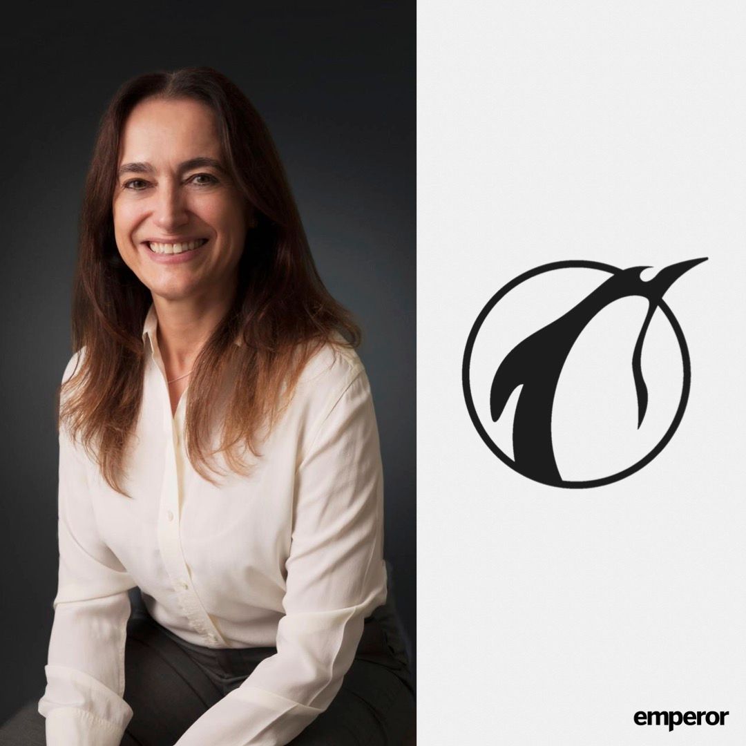 Véronique Schyns beside the Emperor logo.