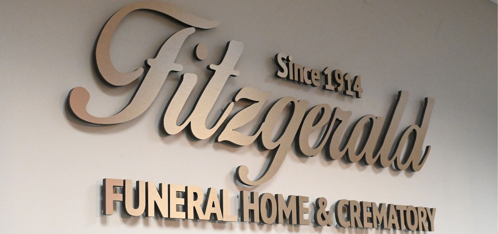 A sign for fitzgerald funeral home and crematory