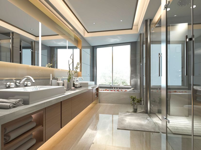 Moderno bagno grigio con mobile lavabo sospeso, vasca ovale, finestra ad arco e accessori dorati.