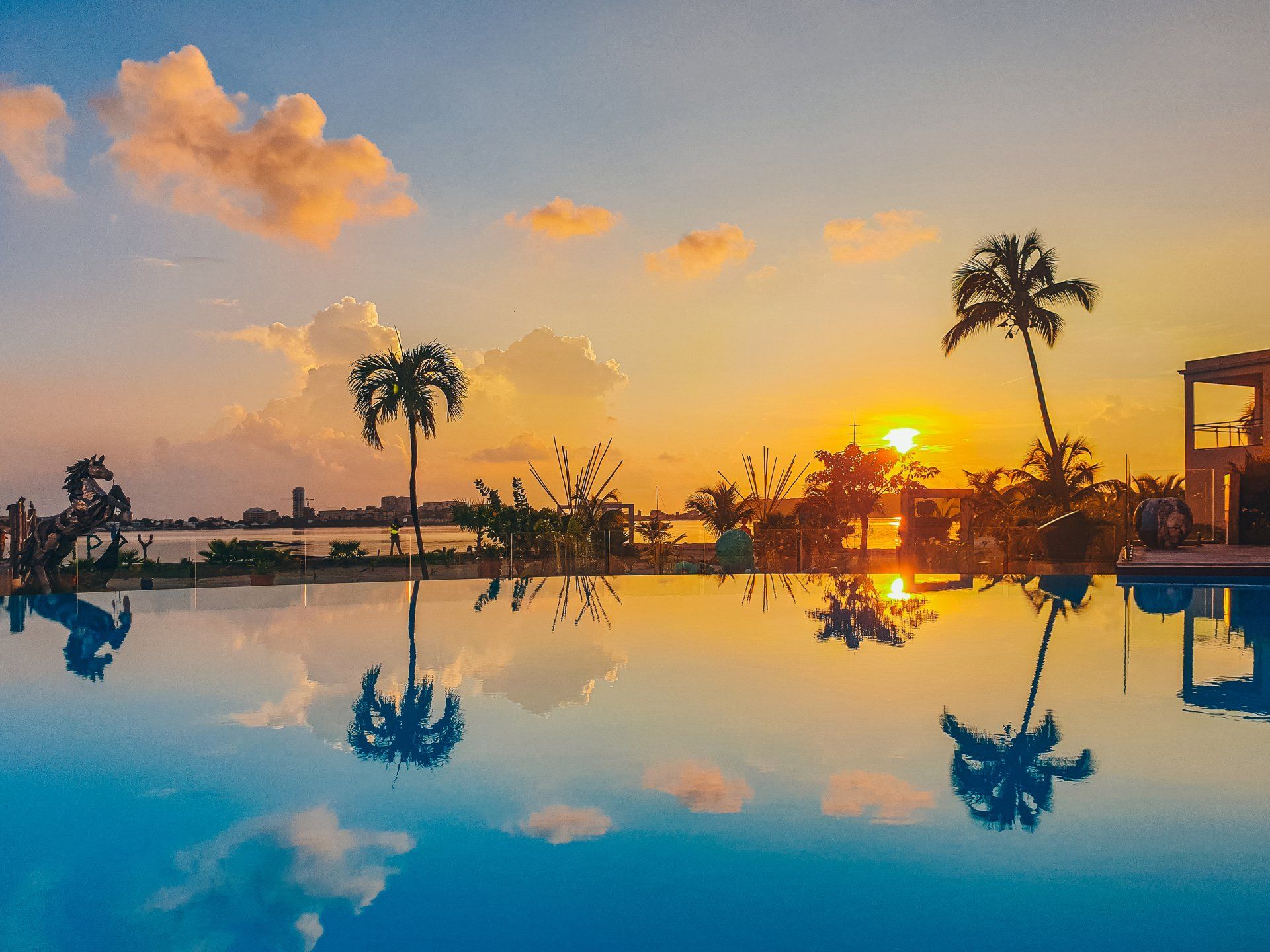 Swimming pool view on sunset
