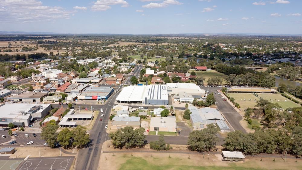 An Aerial View Of A Small Town With Lots Of Buildings And Trees — Central Coast Flyscreen Service In West Gosford, NSW