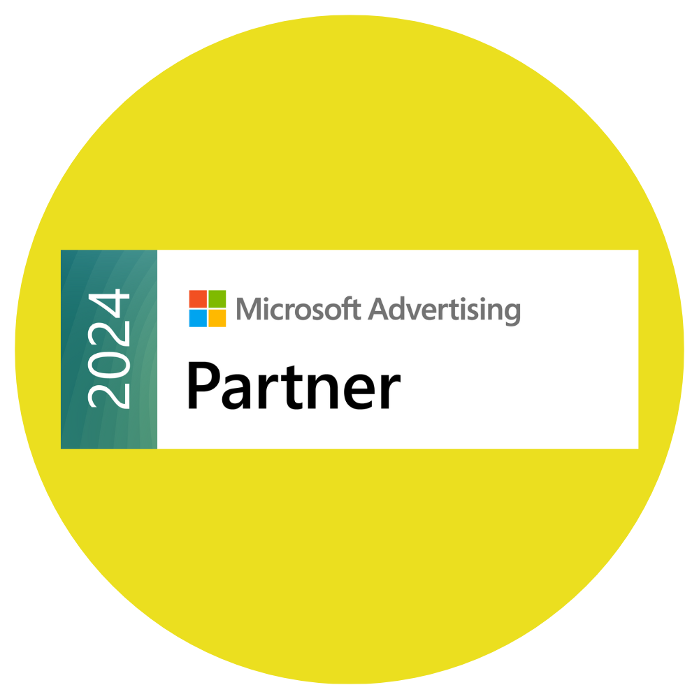 A yellow circle with a microsoft advertising partner logo on it