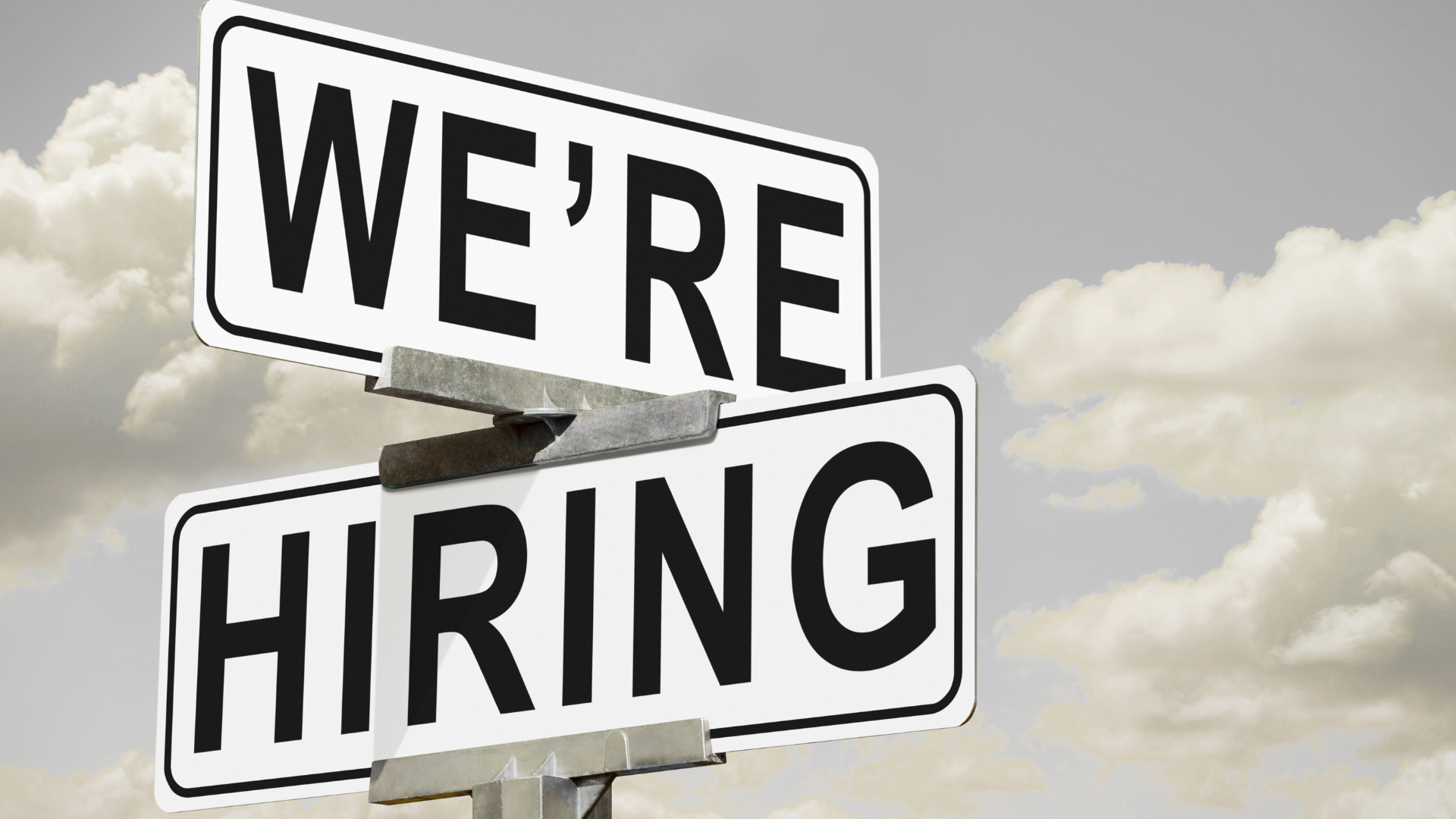 A sign that says we 're hiring on it