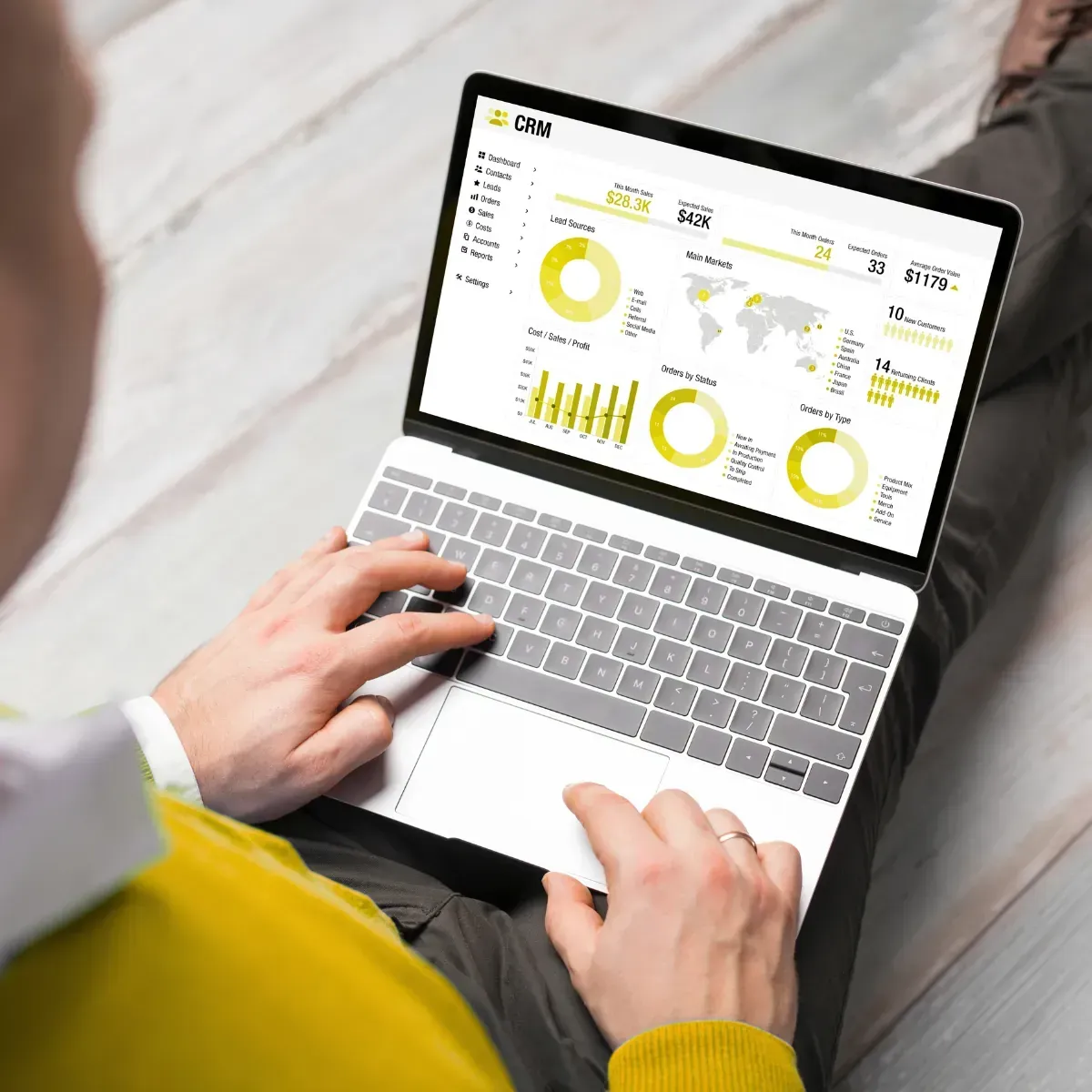 Reviewing digital audio campaign reports on a laptop