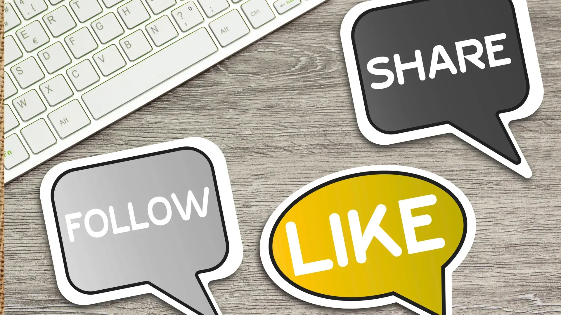 Three speech bubbles with the words follow like and share on them