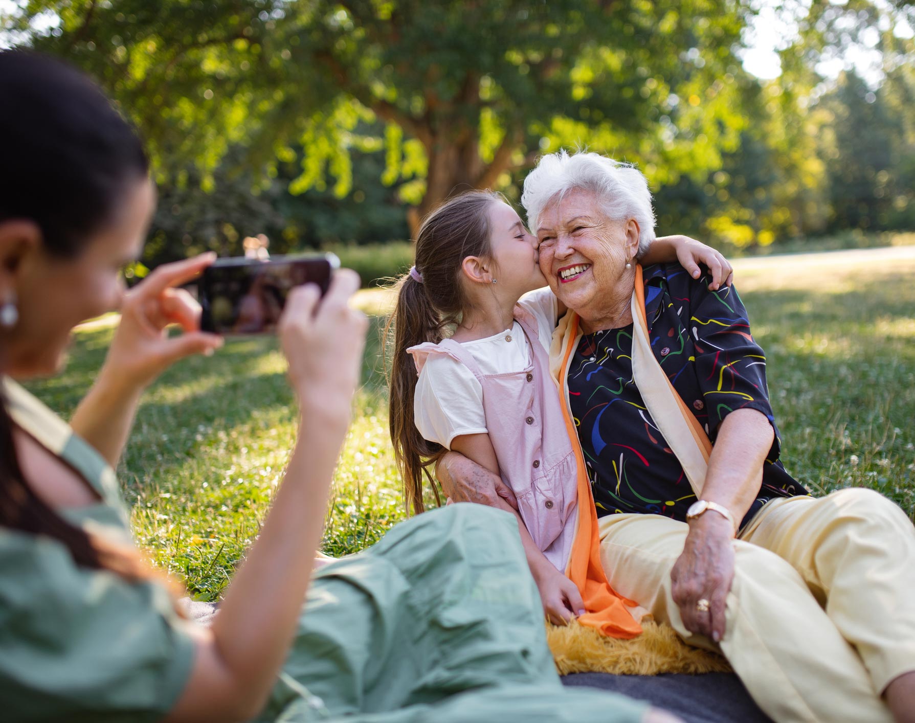 Happy Family Taking Picture — Port Charlotte, FL — Finly Family Insurance Agency Happy Family Taking Picture — Port Charlotte, FL — Finly Family Insurance Agency