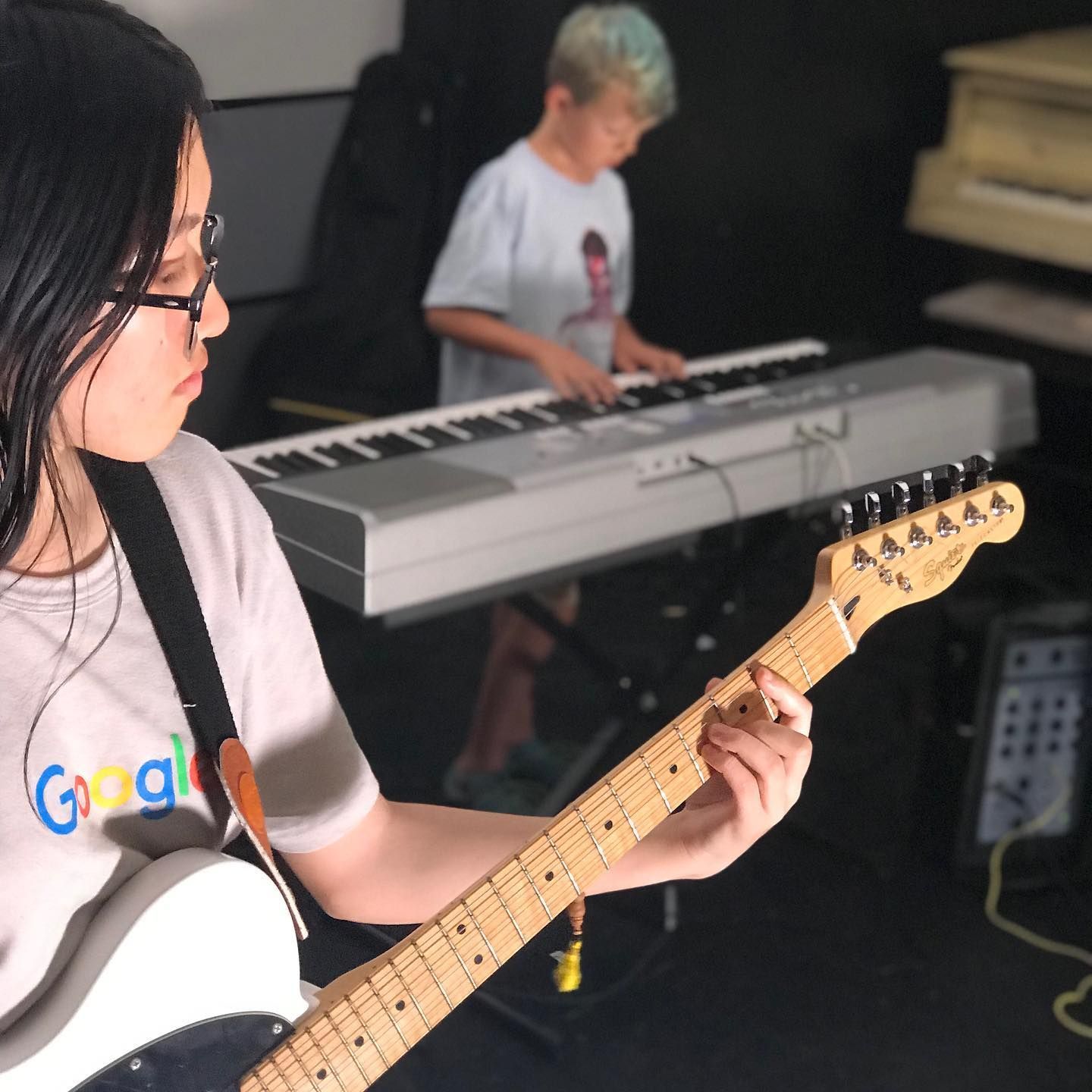 girl playing guitar