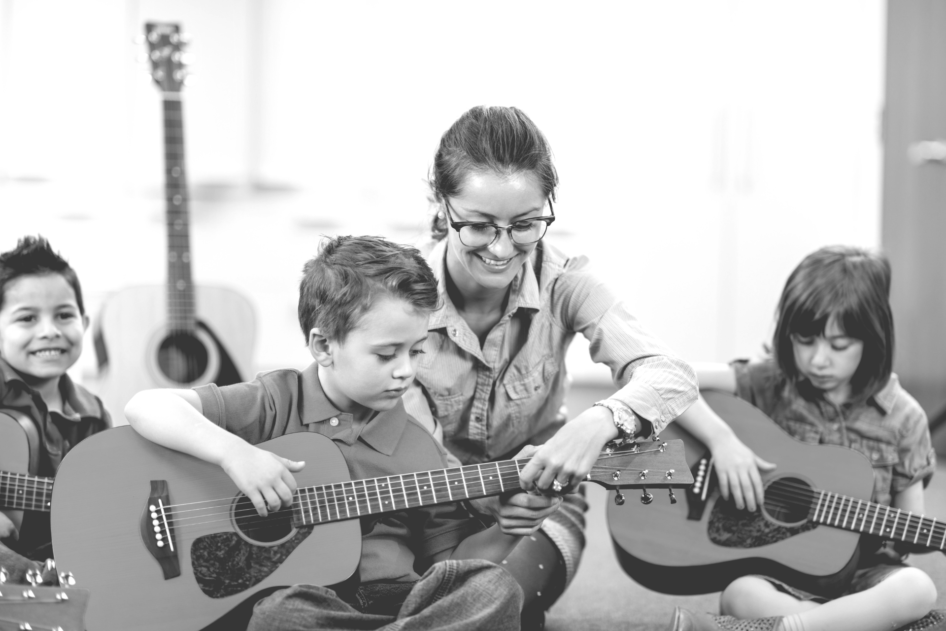 KIDS PLAYING GUITAR