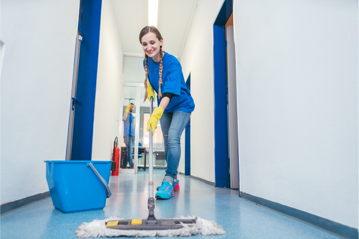 Cleaning service team working in office