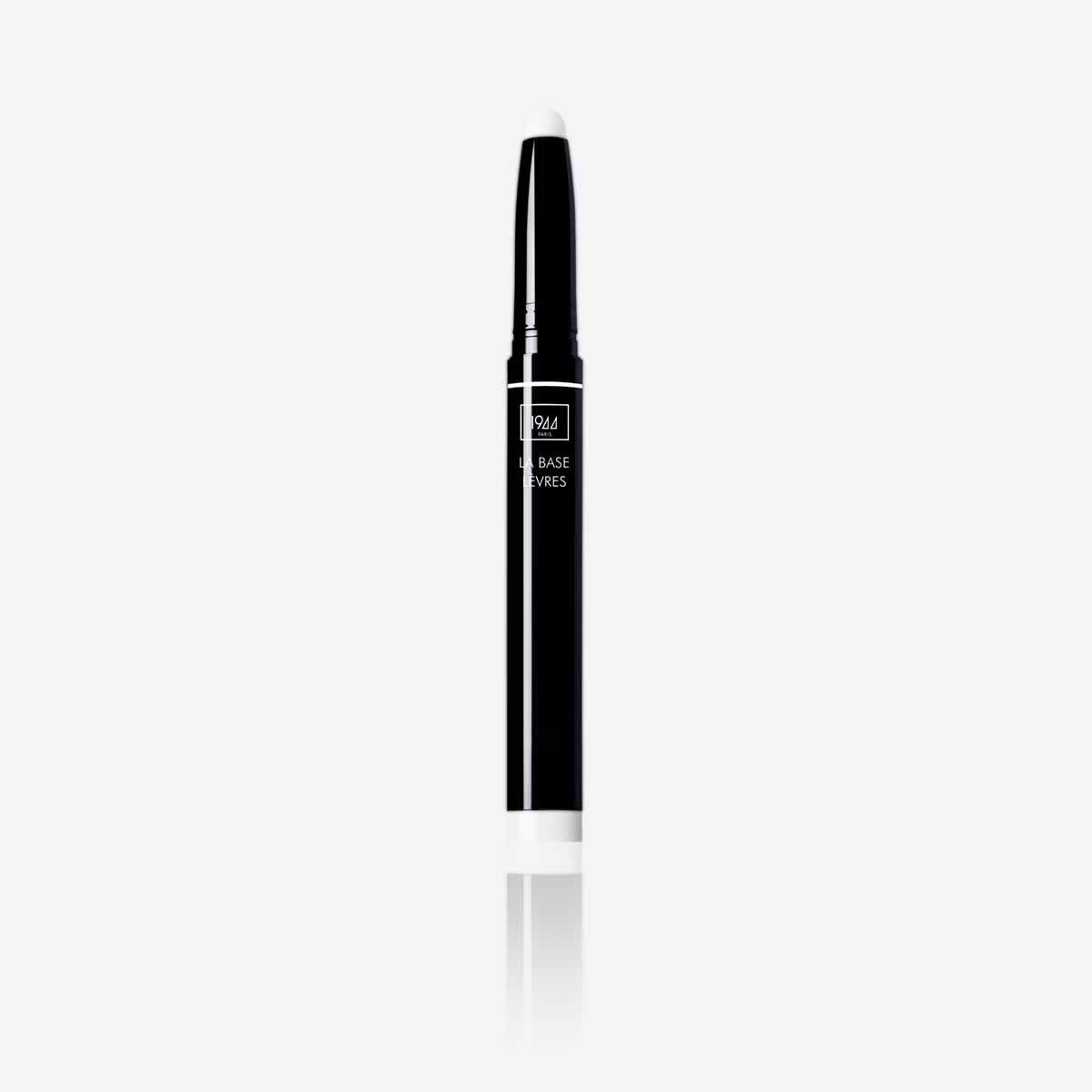 Un stylo noir et blanc sur une surface blanche.