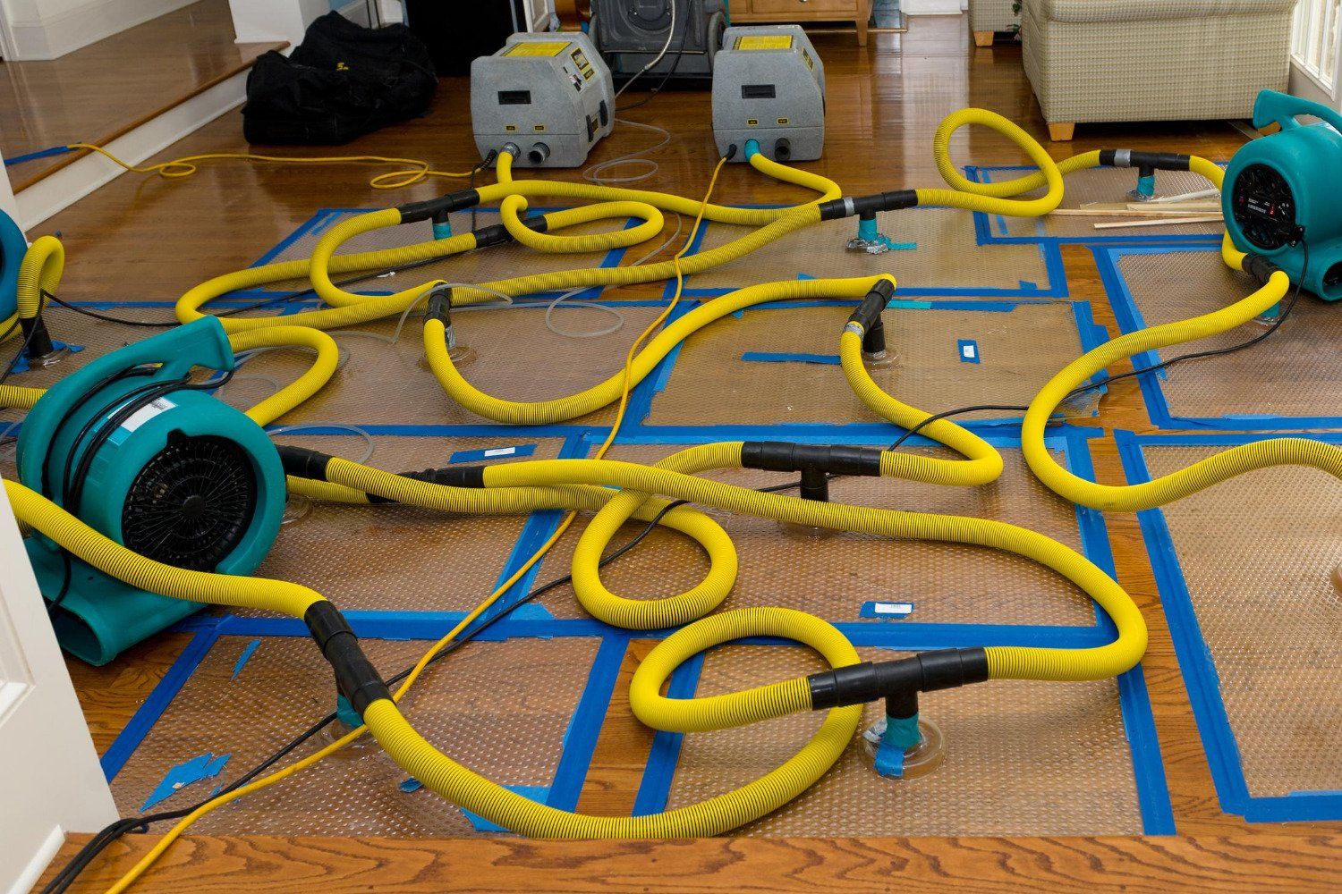 water damage restoration equipment connected to a ft lauderdale home's sump pump system