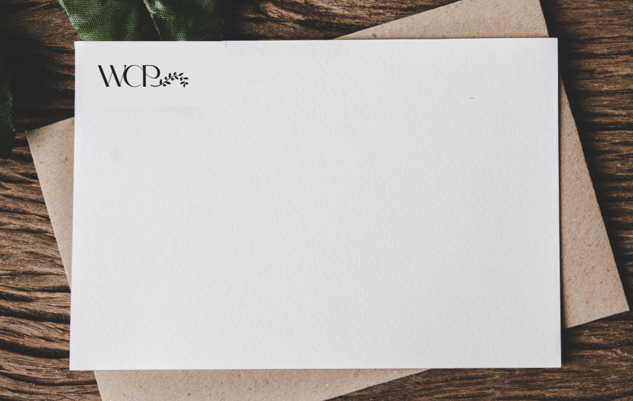 White stationary card with initials 