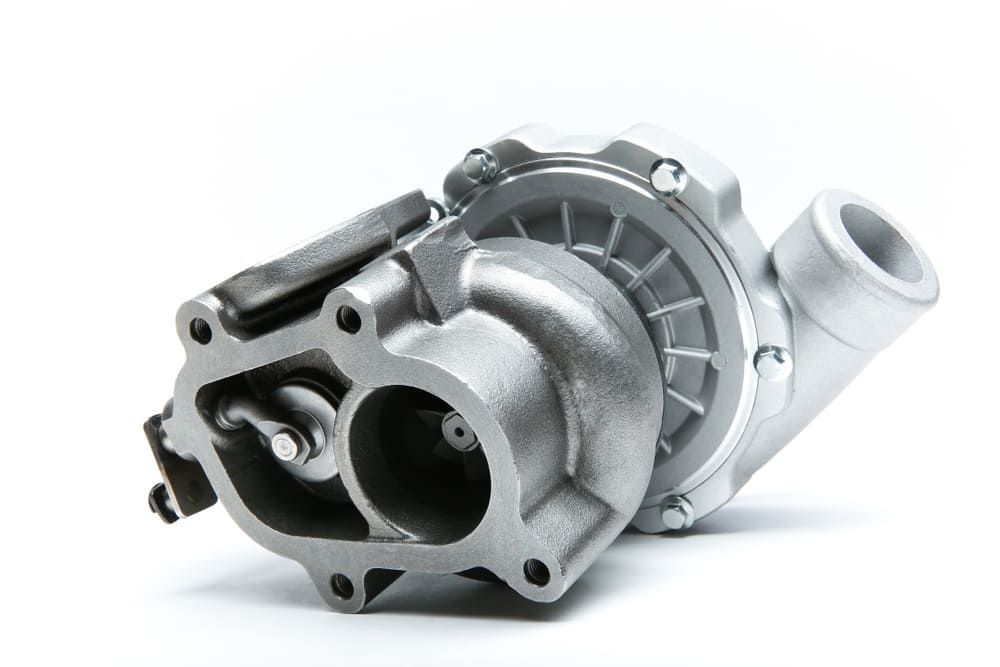 A Close Up Of A Turbocharger On A White Background — Twin City Auto Dismantlers In Albury, NSW