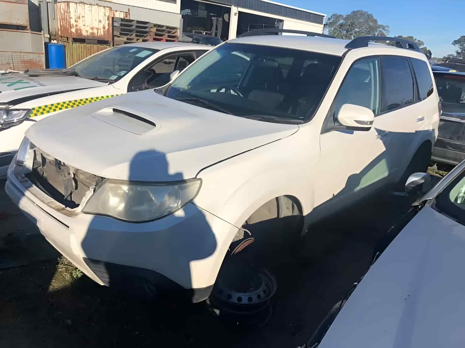 Old White Sedan Car — Twin City Auto Dismantlers In Albury, NSW