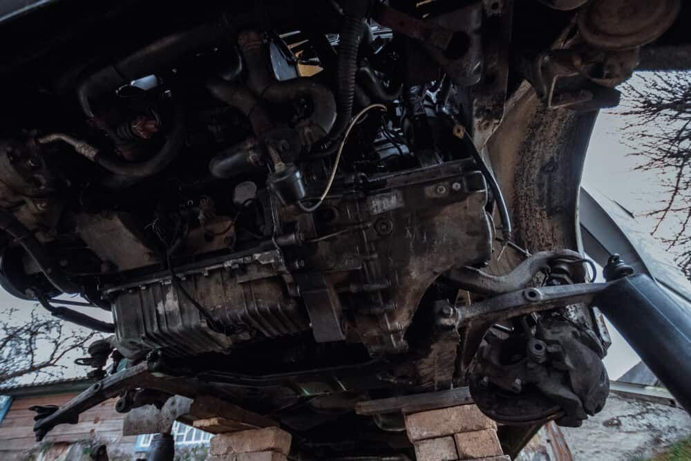 A Car Chassis Is Sitting On Top Of A Pile Of Bricks — Twin City Auto Dismantlers In Wodonga, VIC