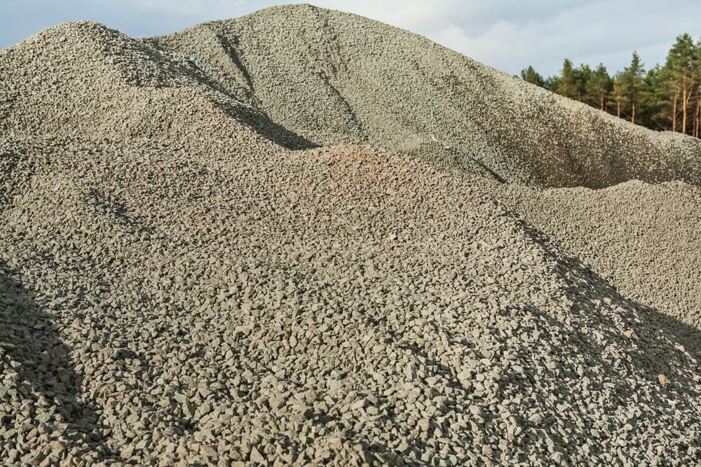 A Large Pile Of Gravel Is Sitting On Top Of A Hill — Tenterfield Timber & Hardware in Tenterfield, NSW