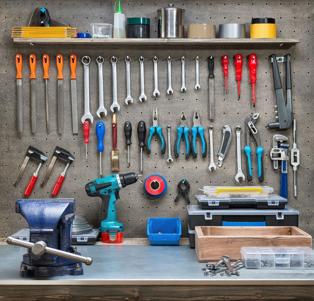 A Workbench With Lots Of Tools Hanging On The Wall — Tenterfield Timber & Hardware in Glen Innes, NSW