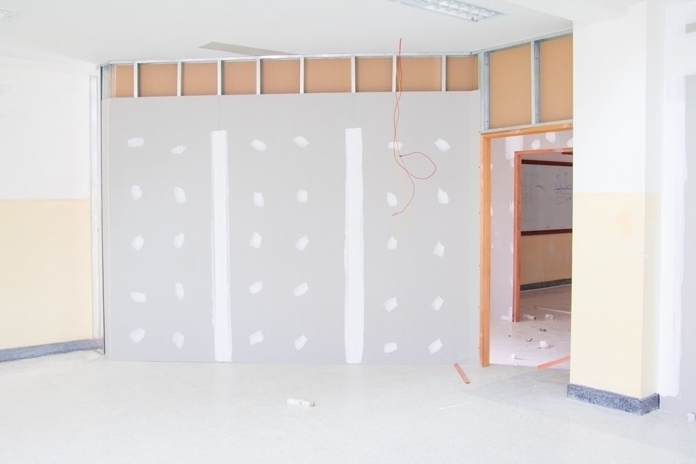 An empty room with a drywall wall and a door — Tenterfield Timber & Hardware in Tenterfield, NSW