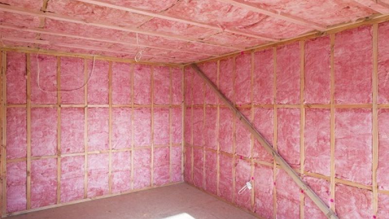 A Bunch Of Rolls Of Insulation Are Stacked On Top Of Each Other — Tenterfield Timber & Hardware in Tenterfield, NSW