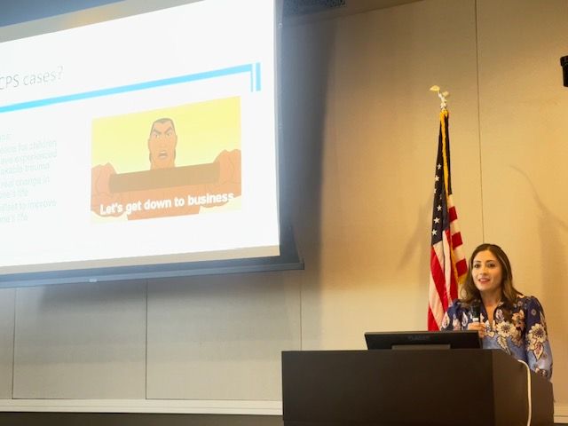 Vanessa Rosa-Kubik standing at a podium