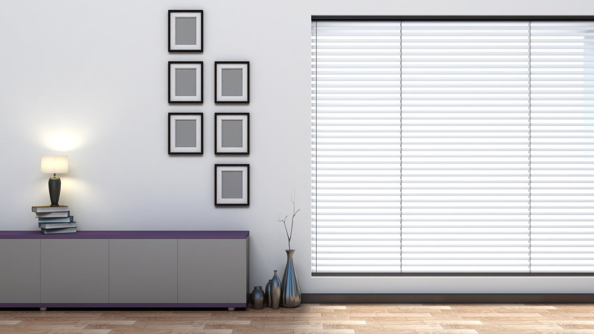 Modern timber floored room, with grey side table below a set of 6 picture frames on the wall, beside closed whte venetian blinds.