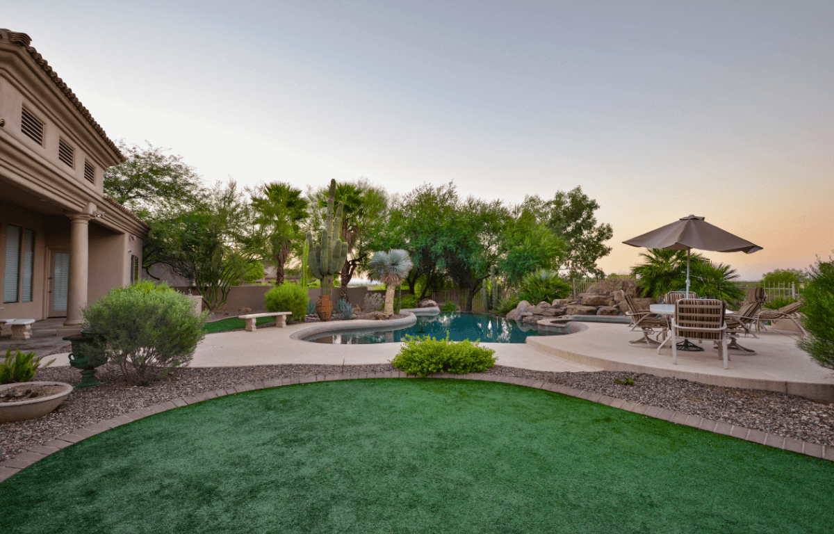 A picture of a lush green Arizona landscape with water