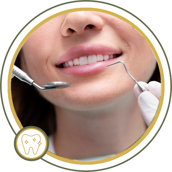 Woman's mouth during dental exam; tools near teeth.
