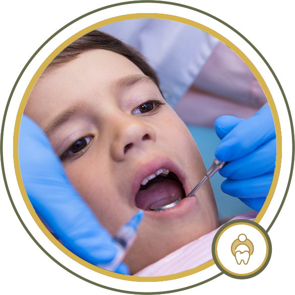 Child at the dentist with mouth open; dentist using tools, blue gloves.