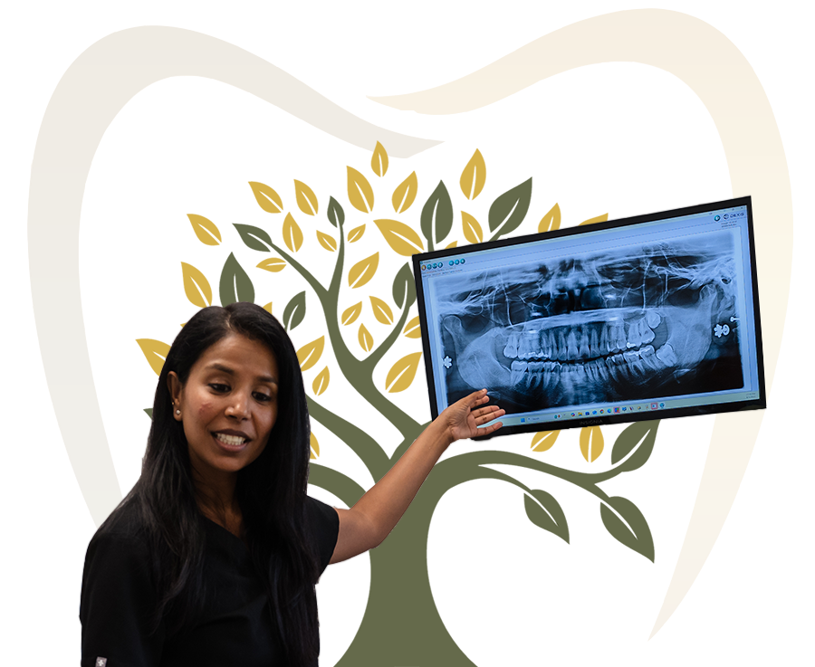 A person pointing at dental X-ray, in front of tree logo.