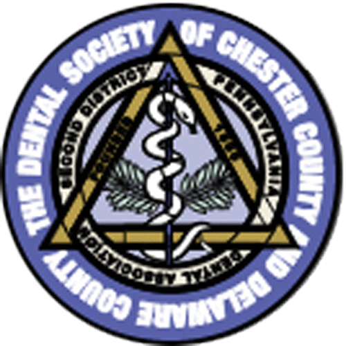 Seal of the Dental Society of Chester and Delaware County, Pennsylvania, with a medical symbol in a triangle.