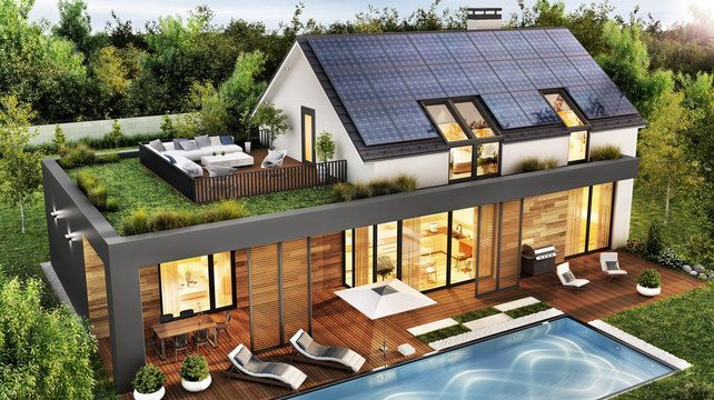 An aerial view of a house with a swimming pool and solar panels on the roof.